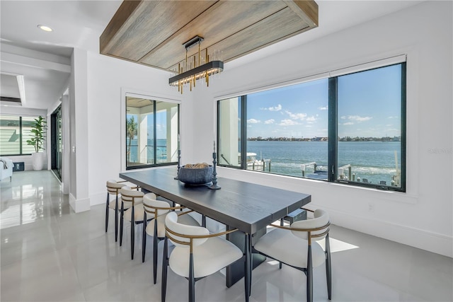 dining area with a water view