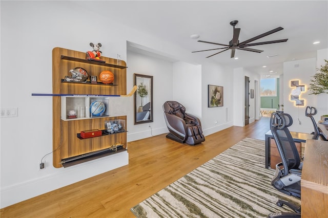 office space with hardwood / wood-style floors and ceiling fan