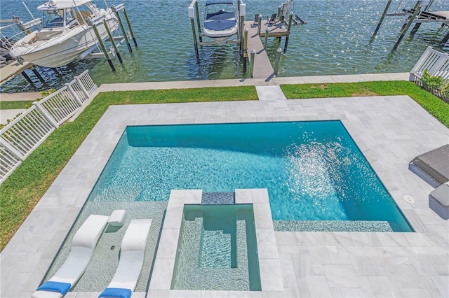 view of pool with a dock and a water view