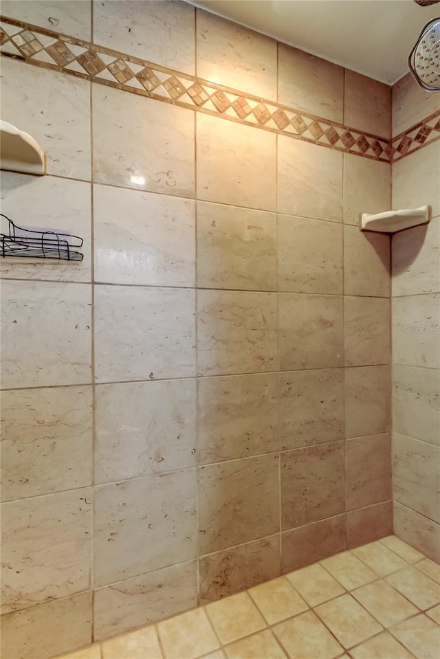 full bath featuring a tile shower