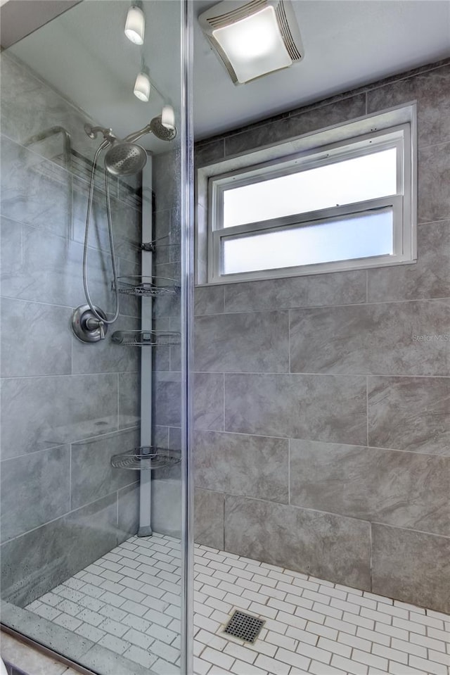 full bathroom with a shower stall