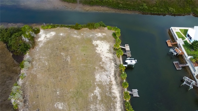 bird's eye view with a water view