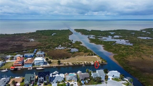 bird's eye view with a water view and a residential view