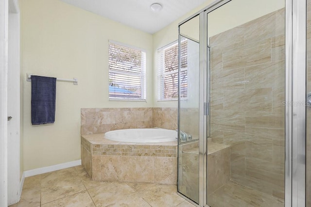 bathroom featuring shower with separate bathtub and tile patterned flooring