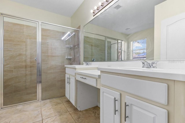 bathroom with an enclosed shower and vanity