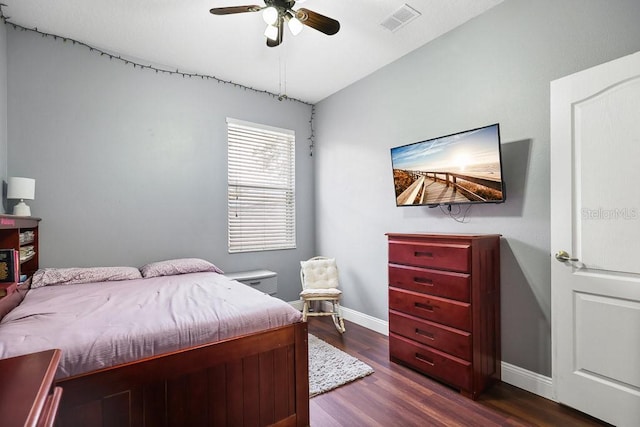 bedroom featuring dark wood-type flooring and ceiling fan