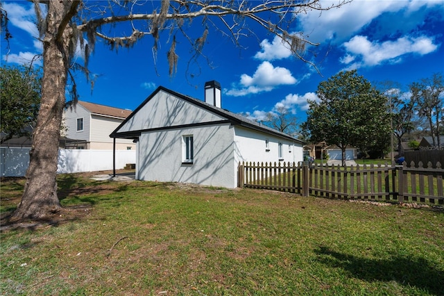 exterior space with a yard