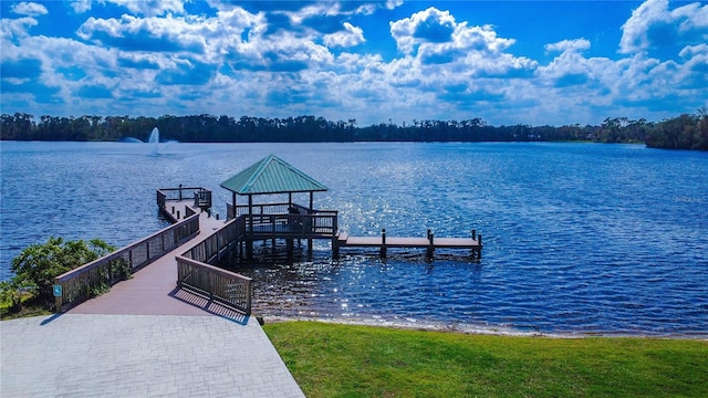 view of dock featuring a gazebo and a water view