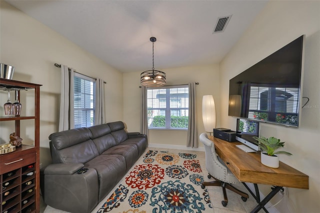 living room featuring light tile patterned flooring