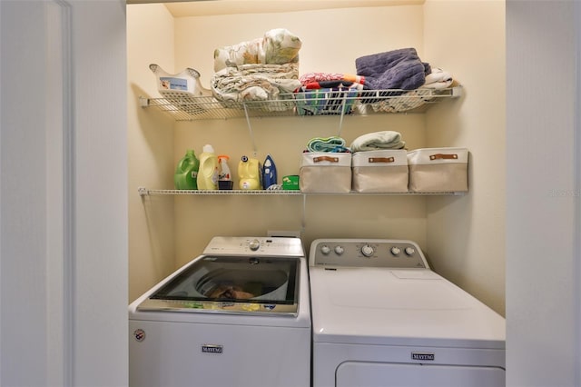 washroom featuring separate washer and dryer