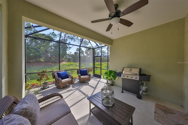 sunroom / solarium with ceiling fan