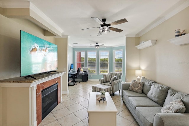 living room featuring a fireplace, crown molding, and light tile patterned floors