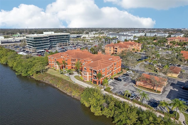 birds eye view of property featuring a water view
