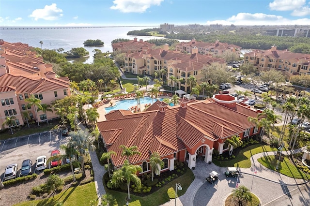 birds eye view of property featuring a water view