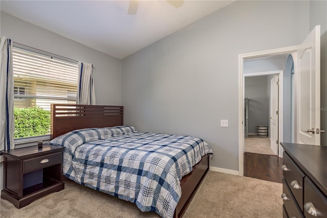 10537 Greensprings Dr, Tampa, FL 33626 - bedroom featuring carpet floors, vaulted ceiling, a ceiling fan, and baseboards