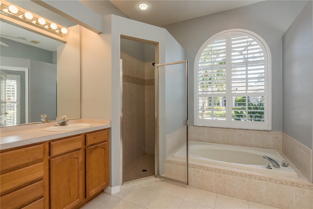10537 Greensprings Dr, Tampa, FL 33626 - full bath featuring a bath, vanity, a shower stall, and healthy amount of natural light