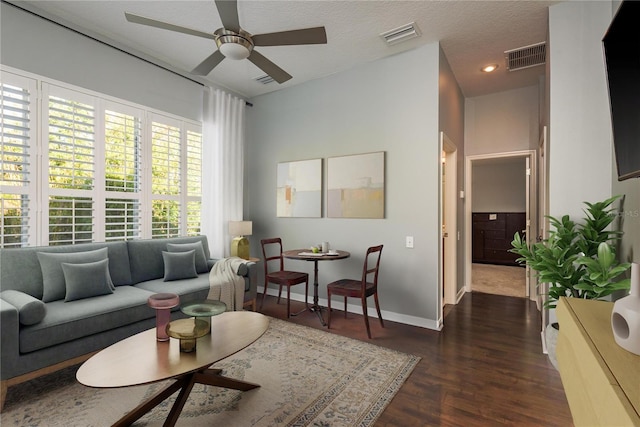 10537 Greensprings Dr, Tampa, FL 33626 - living room featuring dark wood-style floors, baseboards, ceiling fan, and recessed lighting