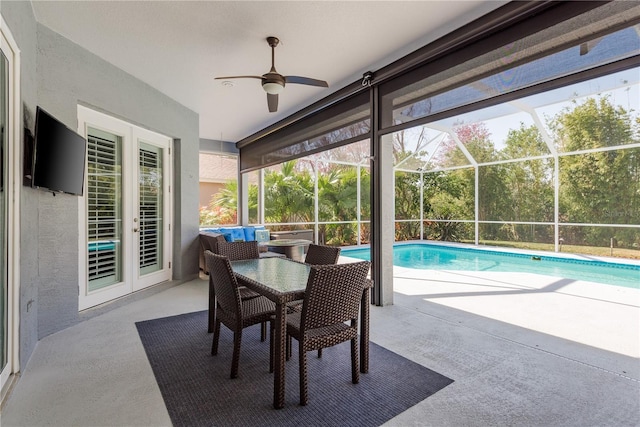 10537 Greensprings Dr, Tampa, FL 33626 - outdoor pool with a patio area, ceiling fan, and a lanai
