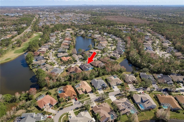 10537 Greensprings Dr, Tampa, FL 33626 - aerial overview of property's location featuring nearby suburban area and a large body of water