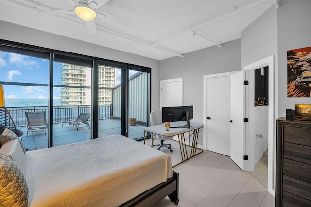 bedroom featuring ceiling fan and access to outside