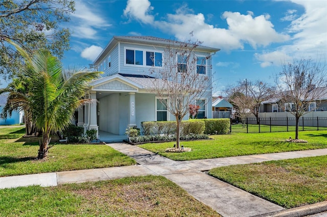 view of front facade featuring a front yard and a porch