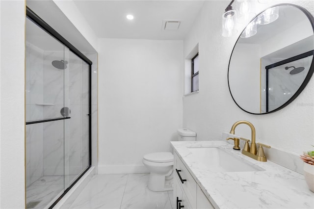 bathroom with vanity, toilet, and walk in shower