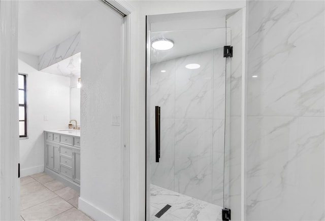 bathroom with vanity and walk in shower