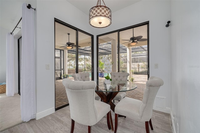 dining area with light wood-type flooring