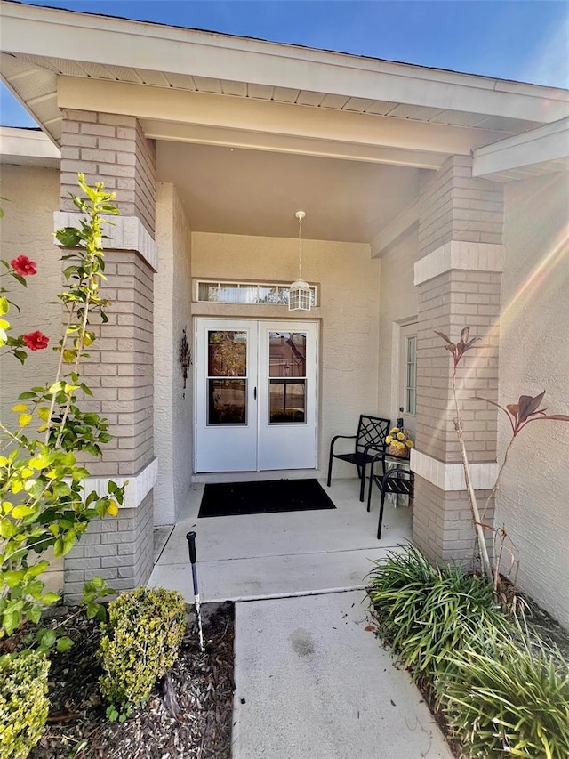 entrance to property featuring french doors