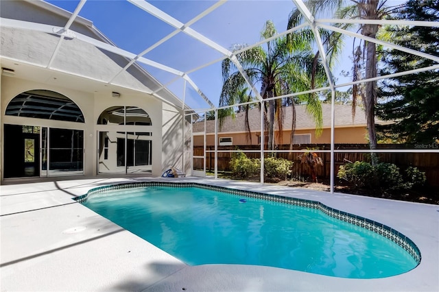 view of pool featuring a patio and a lanai