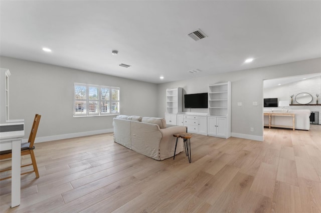 living room featuring light hardwood / wood-style flooring