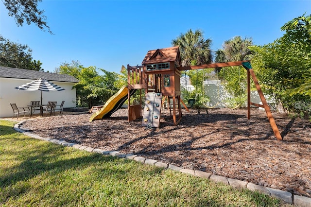 view of play area with a lawn