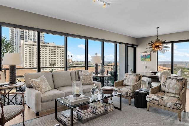 living room featuring an inviting chandelier