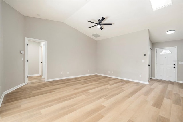 unfurnished living room featuring light wood-type flooring, lofted ceiling, and ceiling fan