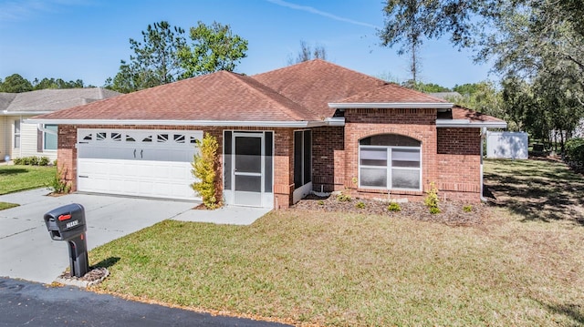 ranch-style house featuring an attached garage, brick siding, a shingled roof, driveway, and a front yard