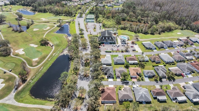 bird's eye view with a residential view, a water view, and golf course view