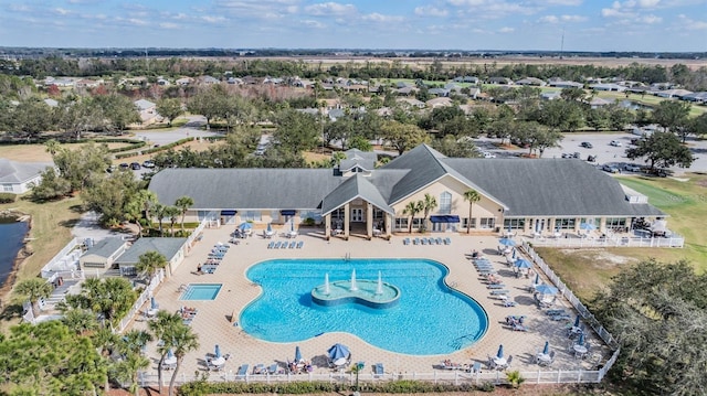 community pool featuring a patio area