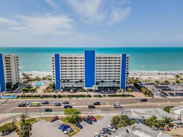 aerial view featuring a water view and a view of the beach