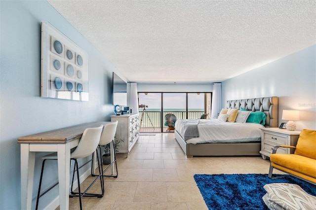 bedroom featuring a textured ceiling