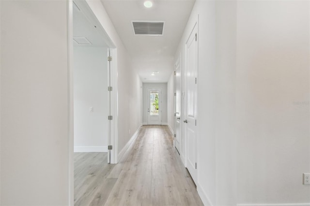11885 Richmond Trl, Parrish, FL 34219 - corridor with light wood-style flooring and baseboards
