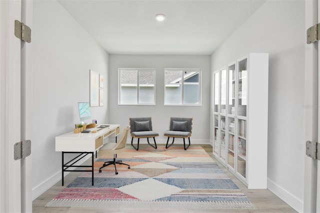 11885 Richmond Trl, Parrish, FL 34219 - office area featuring wood finished floors and baseboards