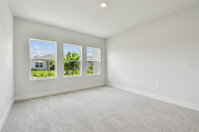 11885 Richmond Trl, Parrish, FL 34219 - carpeted spare room featuring baseboards