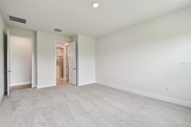 11885 Richmond Trl, Parrish, FL 34219 - unfurnished bedroom featuring carpet flooring, baseboards, and recessed lighting