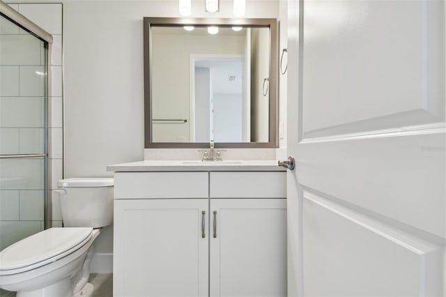 11885 Richmond Trl, Parrish, FL 34219 - bathroom featuring toilet, vanity, and tiled shower