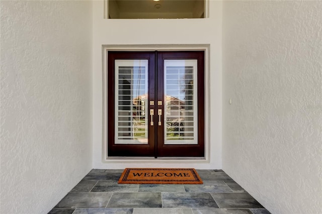 property entrance with french doors