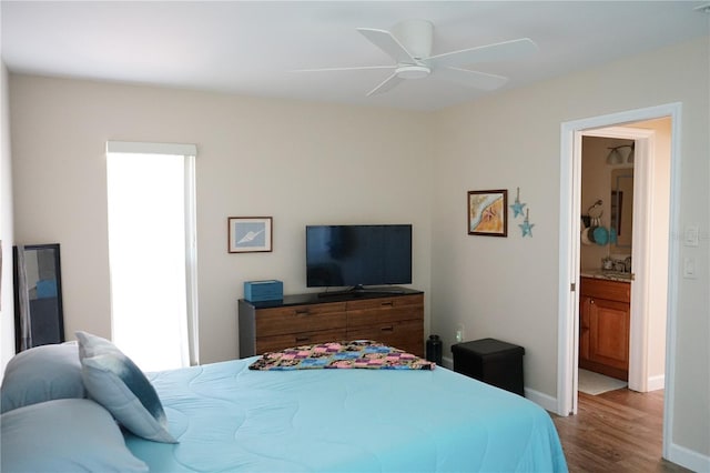 bedroom featuring hardwood / wood-style flooring and ceiling fan