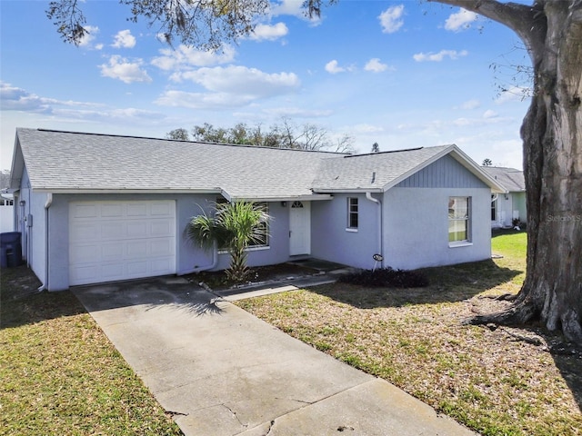 ranch-style house featuring a garage