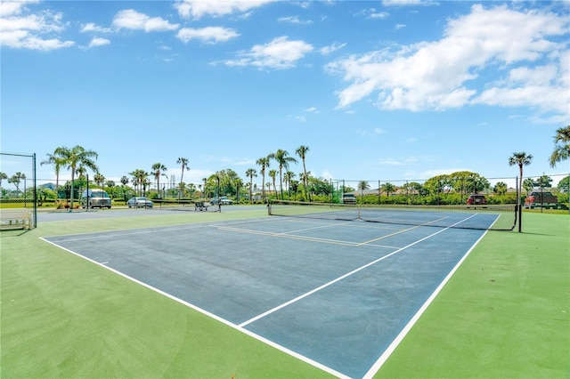 view of sport court with fence