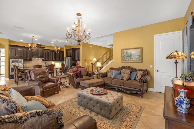 living room with stairs, baseboards, a notable chandelier, and light tile patterned flooring