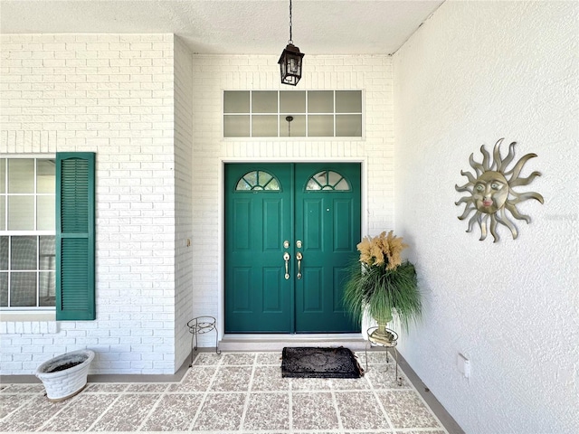 4797 N Lena Dr, Beverly Hills, FL 34465 - doorway to property with brick siding